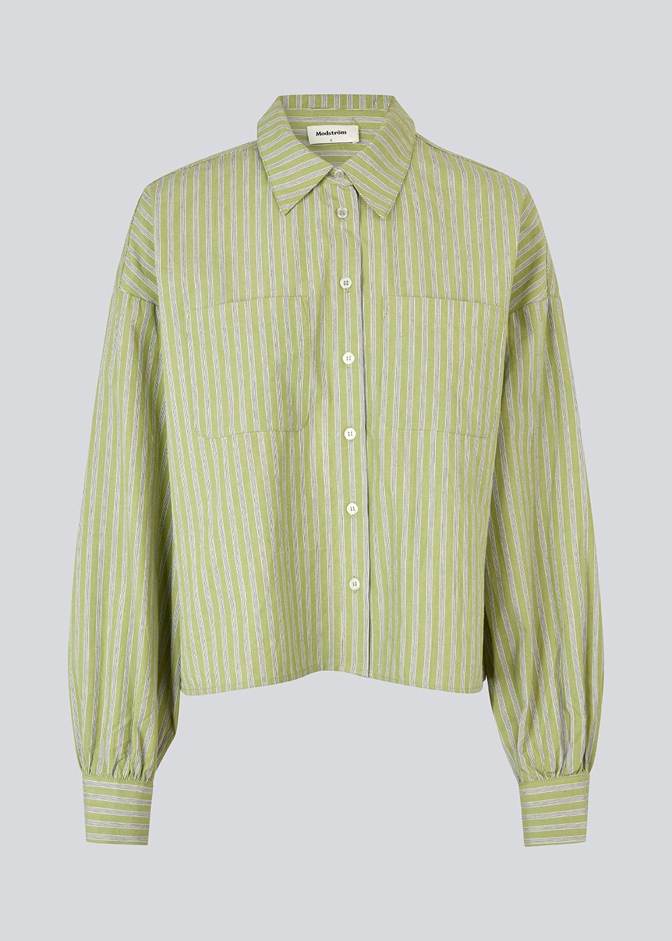 Stribet skjorte i grøn med ballonærmer og feminine detaljer. UmekoMD Shirt har brystlommer, klassisk krave og knaplukning – en opdateret version af den tidløse skjorte. Modellen er 175 cm og har en str. S/36 på.


Materiale:
73% Bomuld
27% Polyester