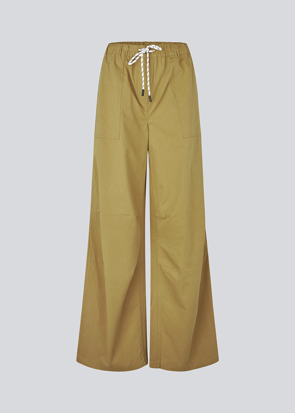 Brede bukser i farven desert med cool, afslappet vibe. UraniaMD Pants har rummelige sidelommer og snøre i taljen for en justerbar pasform og et moderne look.

Materiale:
100% Bomuld