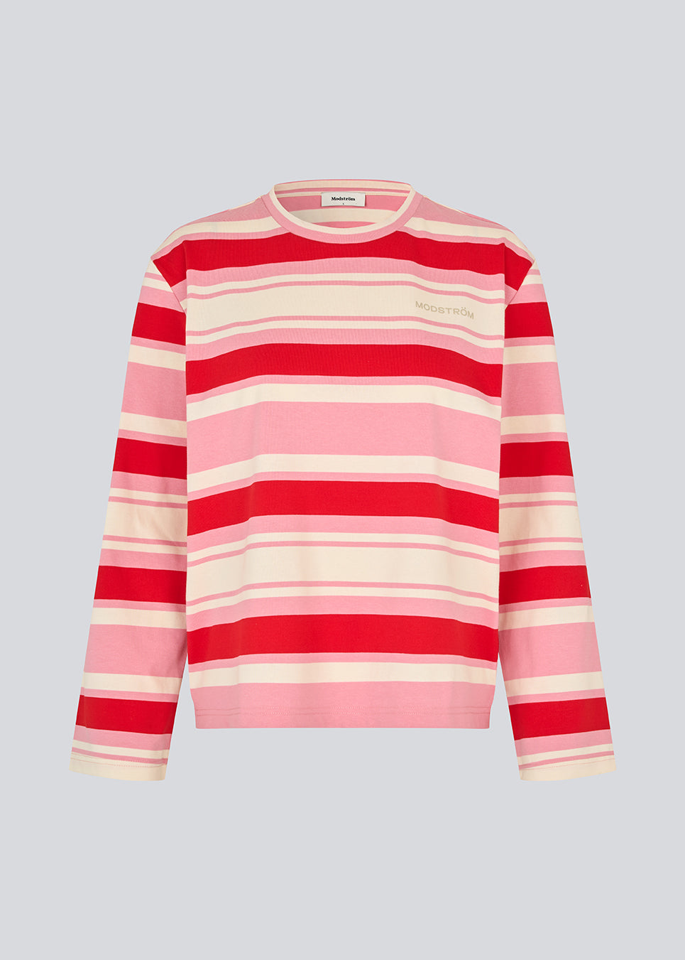 Stribet langærmet T-shirt i rød og pink. Ulvamd stripe LS t-shirt har rund hals, en løs pasform og et diskret brystlogo. En frisk og afslappet style med et tidløst udtryk. Modellen er 175 cm og har en str. S/36 på.


Materiale:
52% Bomuld
48% Polyester