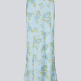 Elegant maxinederdel med et romantisk lyseblåt blomsterprint. Uttamd print skirt er fremstillet i 100% genanvendt polyester og har et flatterende snit, der falder smukt og giver et feminint udtryk. Modellen er 175 cm og har en str. S/36 på.

Materiale:
100% Recycled Polyester