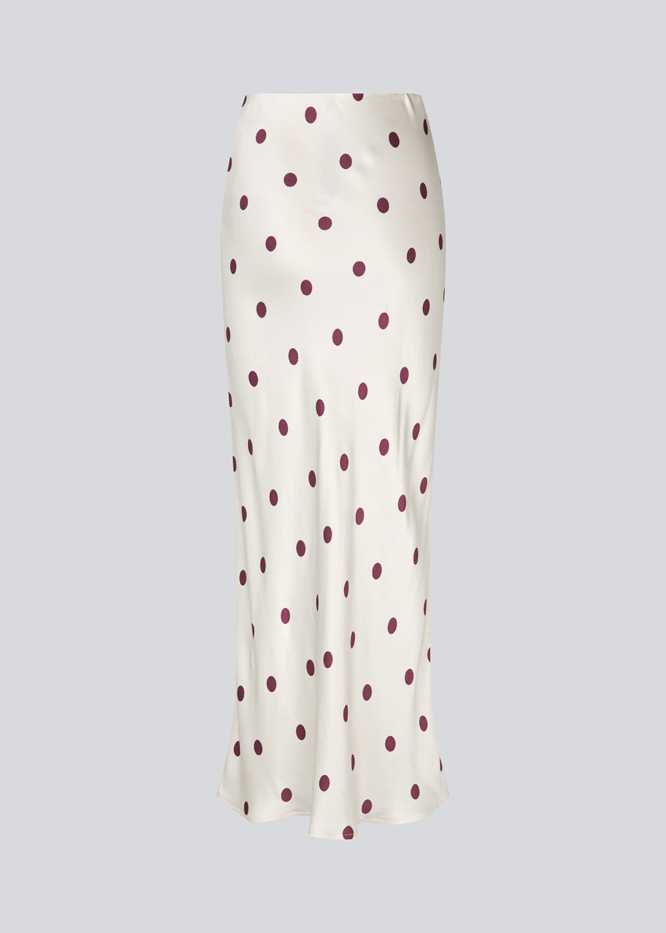 Lang nederdel i hvid satin med polkaprikker. Vanjamd Print Skirt har et løst, elegant fald og elastik i taljen for et behageligt og feminint udtryk. Perfekt til både hverdags- og aftenlooks.&nbsp;