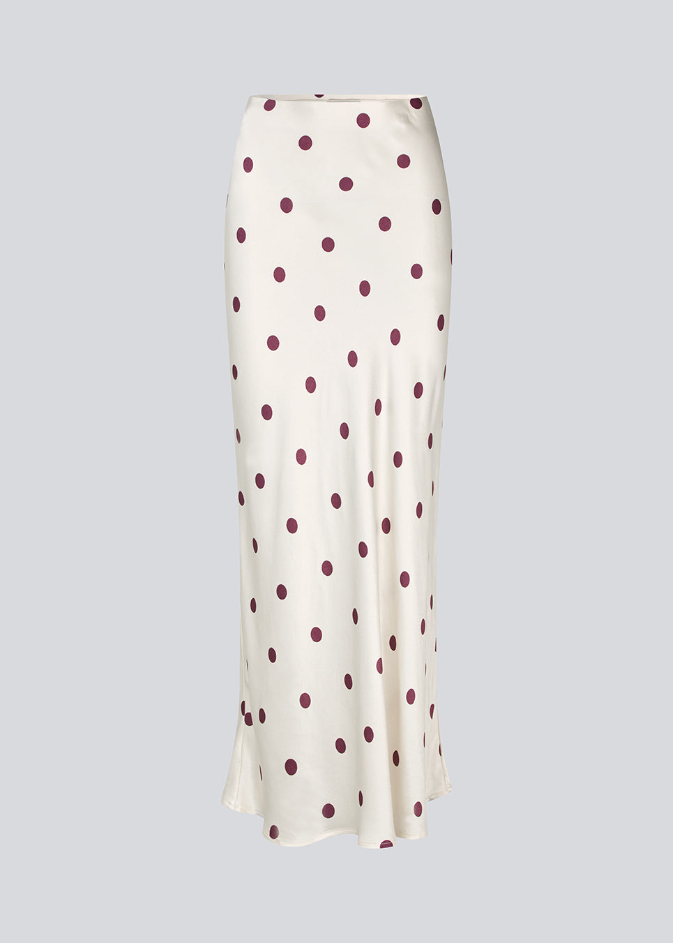 Lang nederdel i hvid satin med polkaprikker. Vanjamd Print Skirt har et løst, elegant fald og elastik i taljen for et behageligt og feminint udtryk. Perfekt til både hverdags- og aftenlooks.