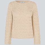 Strikket langærmet beige top med hulmønster, perfekt til lag-på-lag. VesterMD O-neck er fremstillet i 100% økologisk bomuld og har en klassisk rund hals.