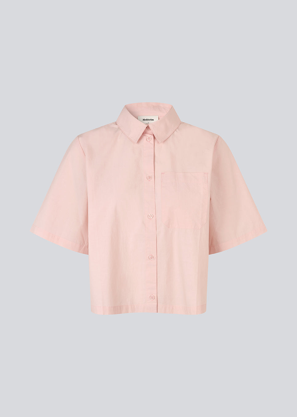 Kort skjorte i lyserød med brede korte ærmer. VilbertMD shirt er fremstillet i 100% økologisk bomuld og har klassiske detaljer som krave, knappelukning og brystlomme.