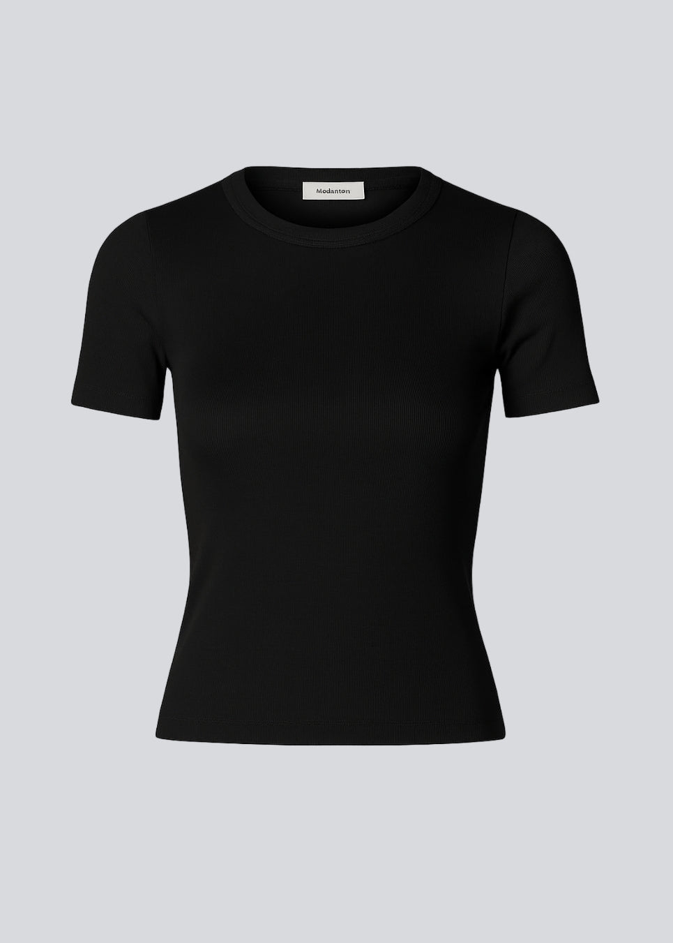 Lækker sort basic t-shirt i en blød bomuldsrib med stretch. Igormd short t-shirt har en tætsiddende pasform med korte ærmer.&nbsp;