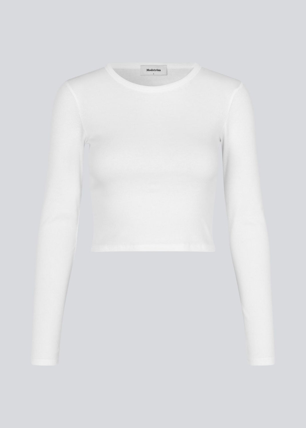 Lækker basic crop top i hvid i en blød bomuldsrib med stretch. IgorMD LS crop top har en tætsiddende, cropped pasform med lange ærmer.