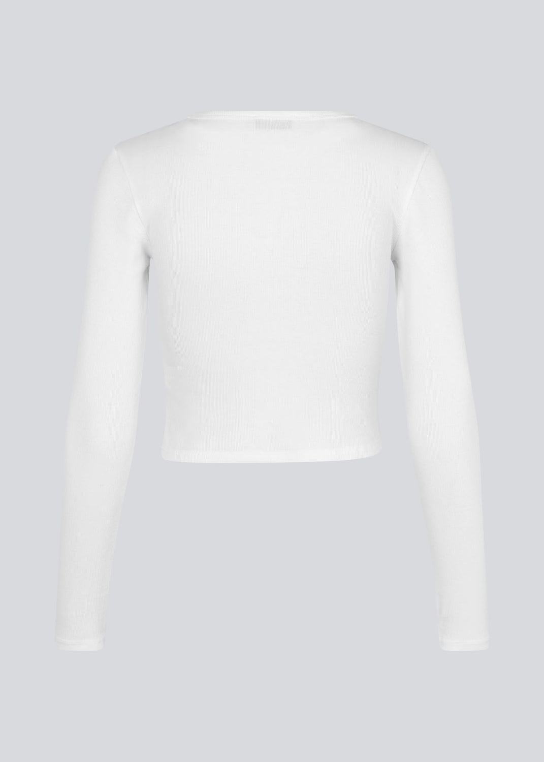 Lækker basic crop top i hvid i en blød bomuldsrib med stretch. IgorMD LS crop top har en tætsiddende, cropped pasform med lange ærmer.