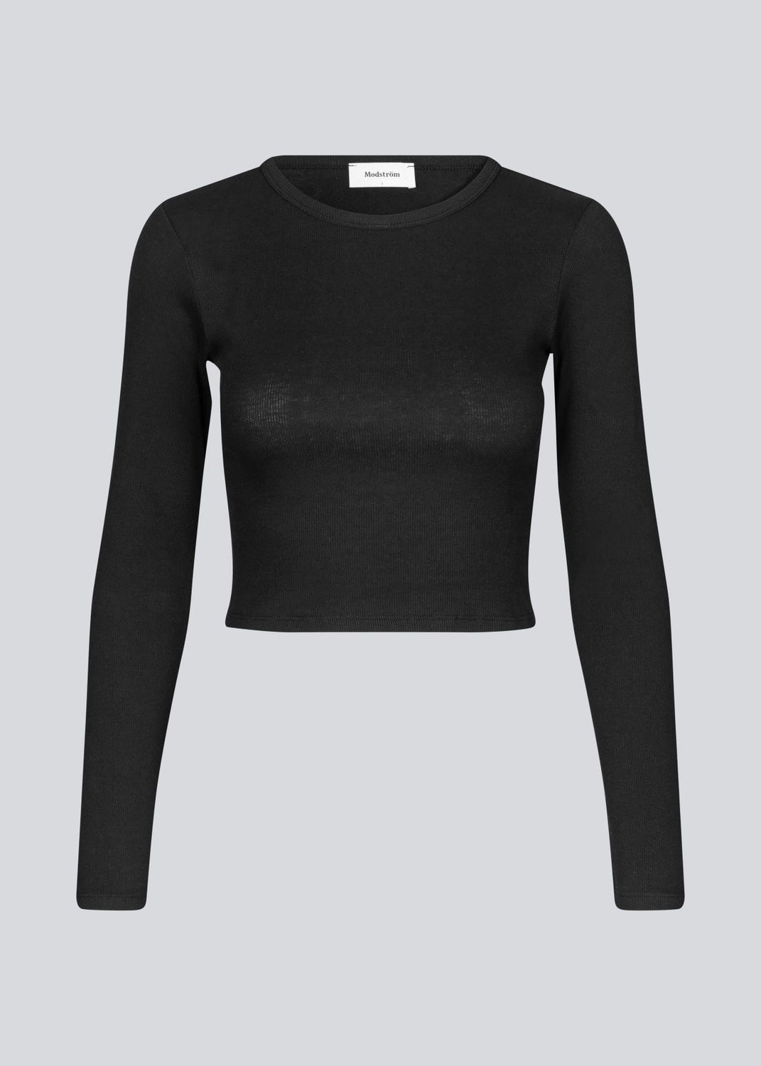 Lækker basic crop top i sort i en blød bomuldsrib med stretch. IgorMD LS crop top har en tætsiddende, cropped pasform med lange ærmer.