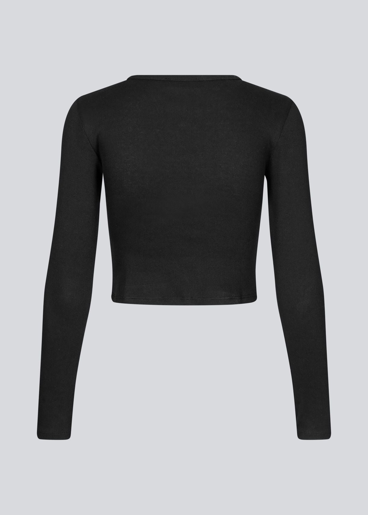 Lækker basic crop top i sort i en blød bomuldsrib med stretch. IgorMD LS crop top har en tætsiddende, cropped pasform med lange ærmer.