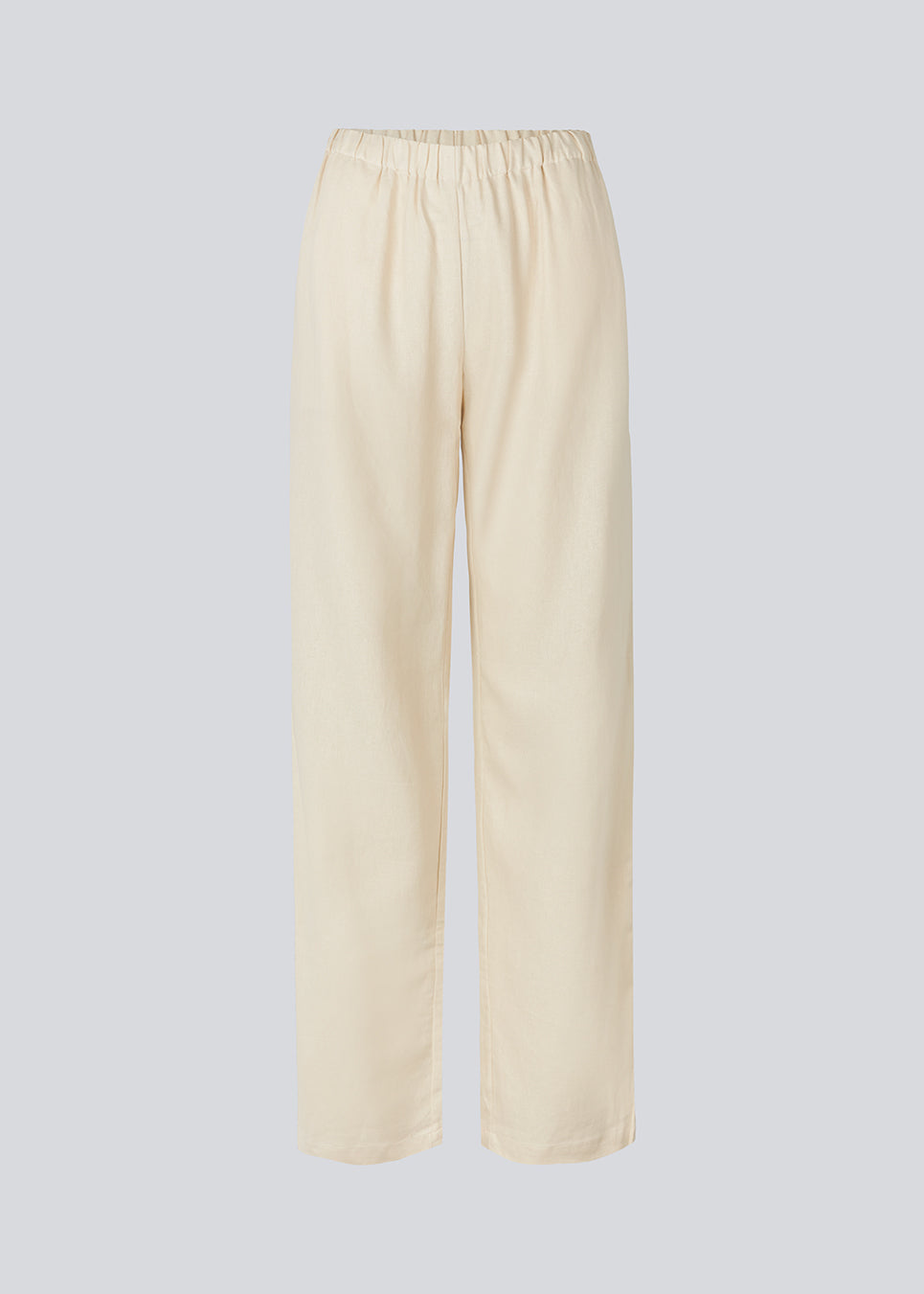 Lange bukser i beige i et relaxed fit med lange brede ben, og elastik i taljen for ekstra komfort. TulsiMD pants er lavet i en blød blanding af hør og rayon. 