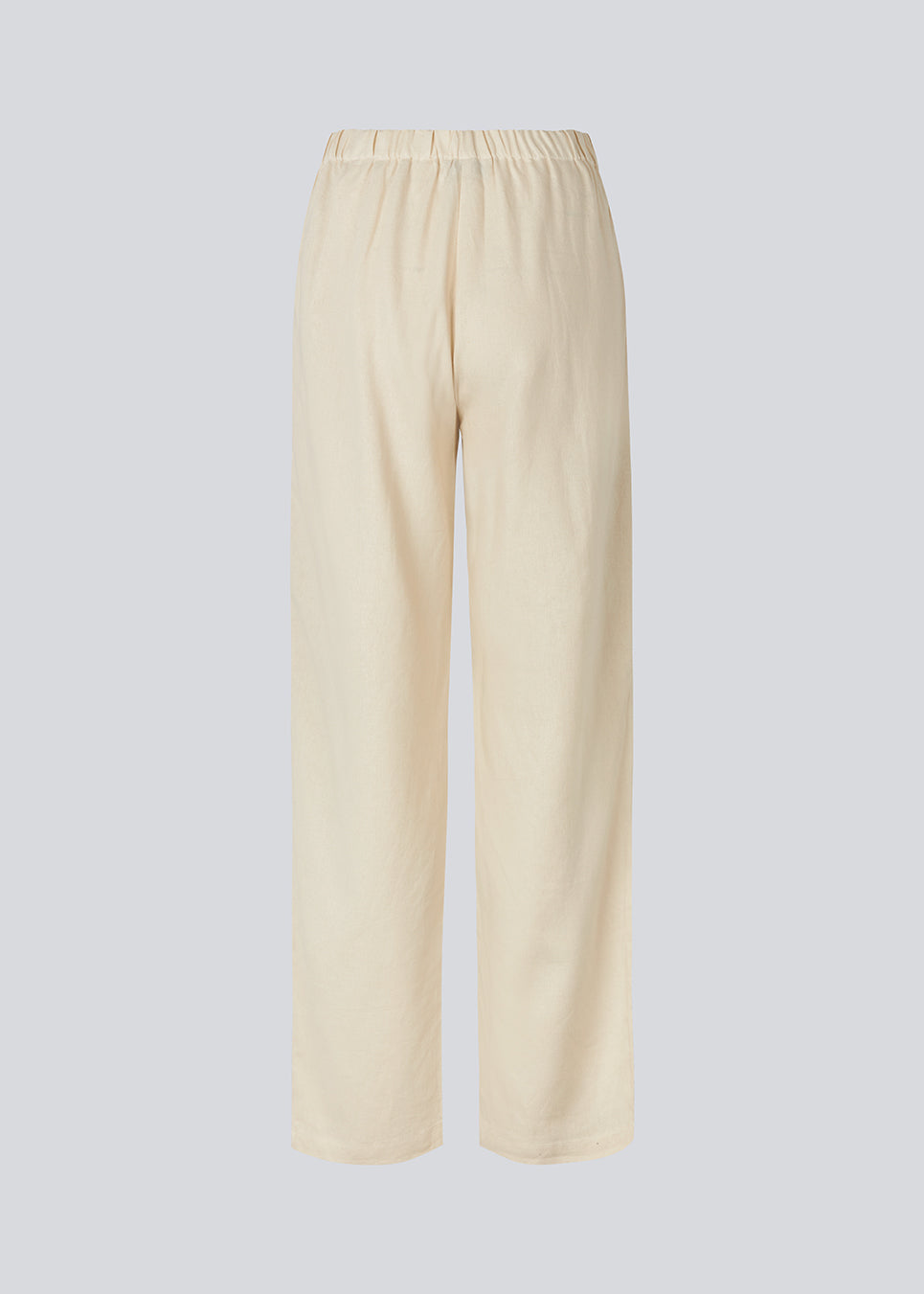 Lange bukser i beige i et relaxed fit med lange brede ben, og elastik i taljen for ekstra komfort. TulsiMD pants er lavet i en blød blanding af hør og rayon. 