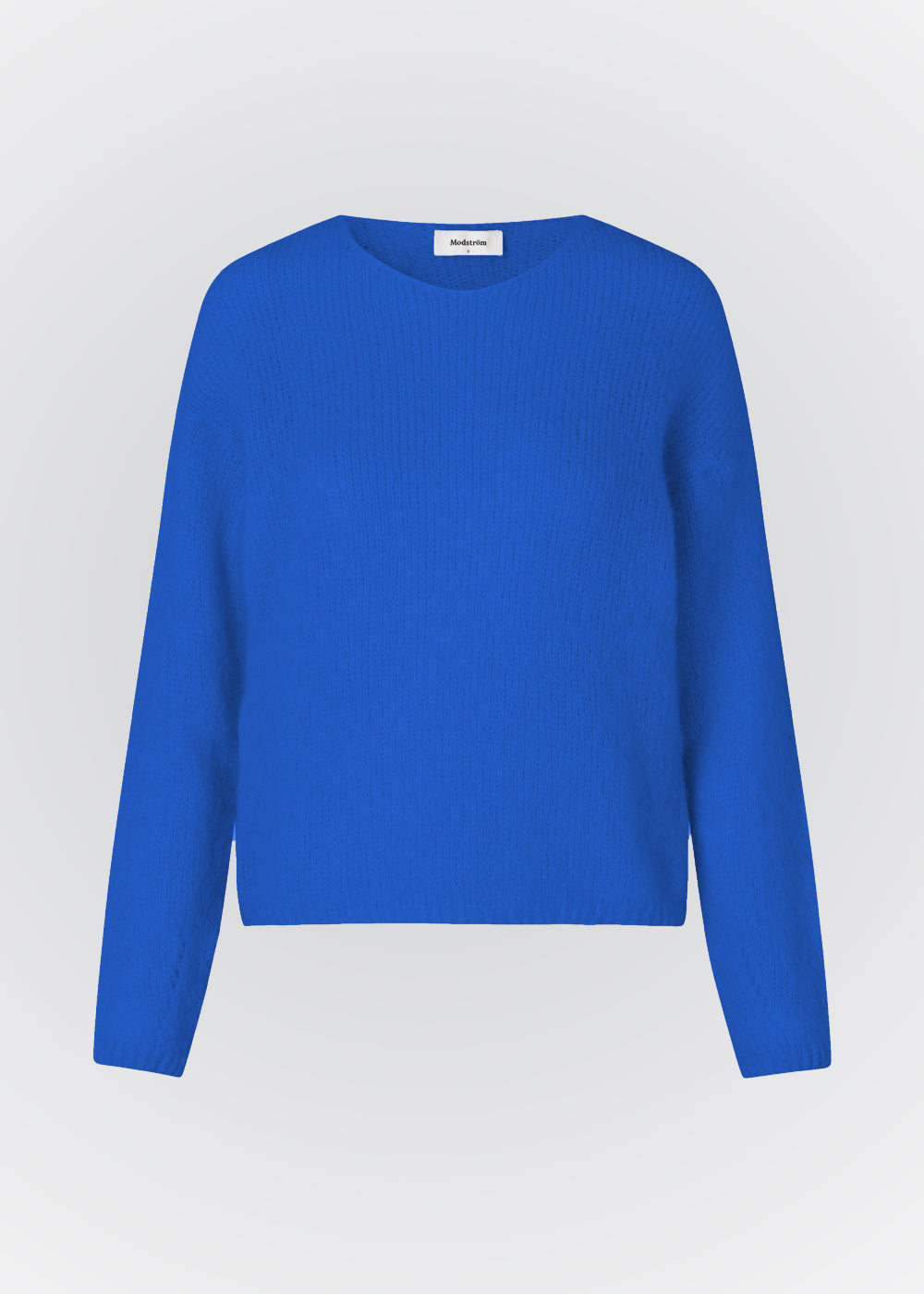 Afslappet striktrøje i blød mohairkvalitet. BertyMD v-neck har en v-halsudskæring og lange ærmer med lav skuldersøm. Trøjen er en smule gennemsigtig.