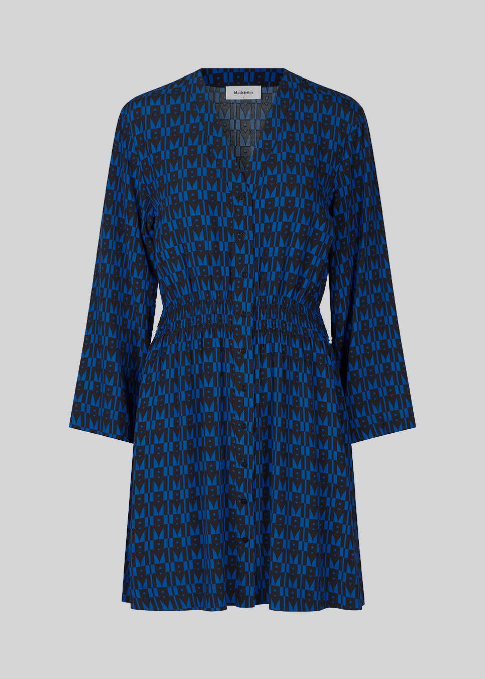 Kort kjole i farven: Graphic Heart Bright Ocean, i mere ansvarlig kvalitet med print. BorysMD print dress har dyb v-udskæring med knaplukning fortil og smock-detalje ved taljen. Lange, brede ærmer.