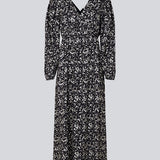 Lang kjole med pufærmer med elastik, v-udskæring foran og bagpå og elastisk detalje i taljen. CelineMD print dress er syet i en EcoVero viskose med blomsterprint.