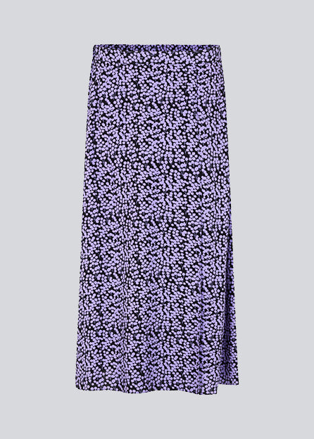 Midi nederdel med løs pasform og slids i siden. ChesliMD print skirt har betrukket elastik i taljen for komfort.  Modellen er 177 cm og har en størrelse S/36 på.