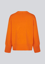 Finstrikket, oversized orange trøje i bomuldsstrik. CorbinMD o-neck har en ribstrikket rund hals, lange brede ærmer og brede ribkanter ved ærmer og forneden.
