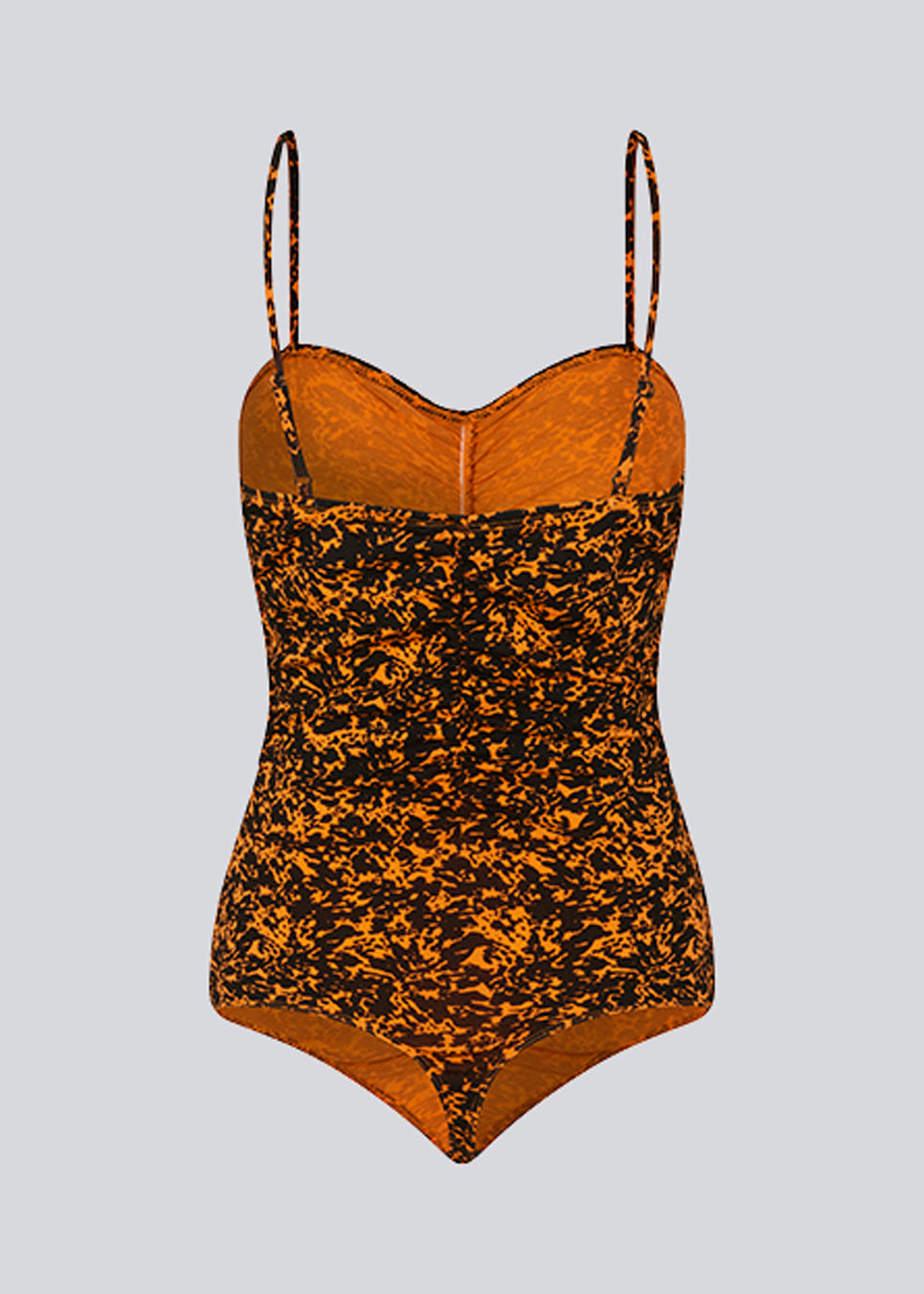 Bodystocking med tætsiddende pasform, hjerteformet udskæring med rynkedetalje og tynde justerbare stropper. CurtisMD print bodystocking har fint blomsterprint.