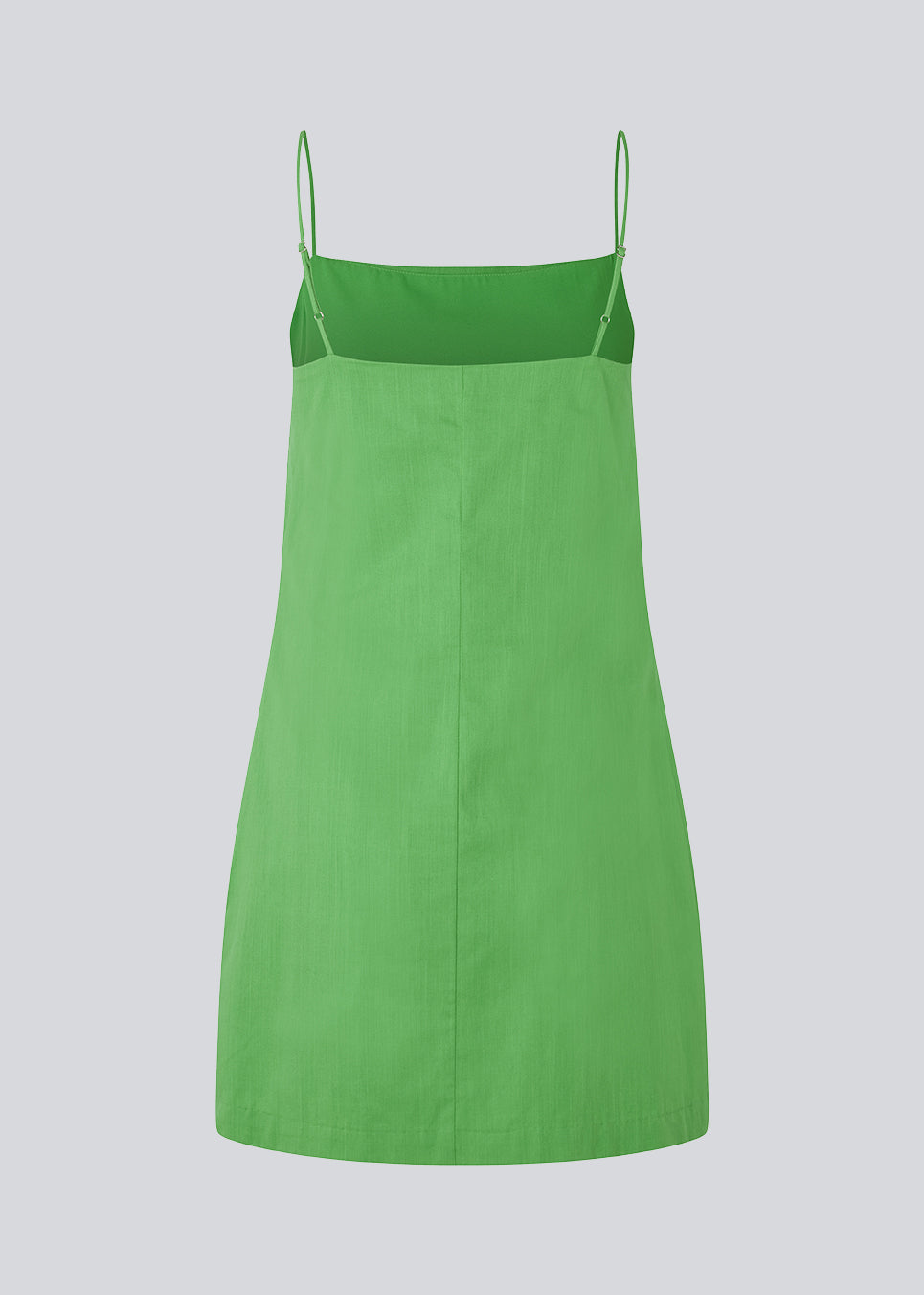 Kort kjole i grøn med enkelt udtryk i vævet bomuld. CydneyMD dress er let figursyet, har justerbare smalle stropper og skjult lynlås i den ene side. Modellen er 174 cm og har en størrelse S/36 på.