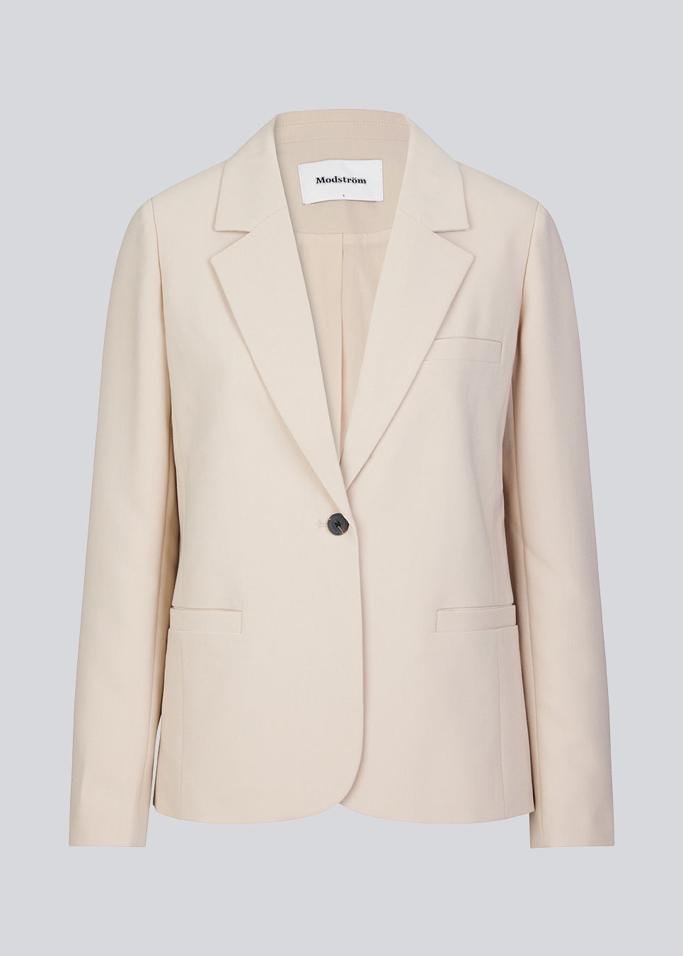 Klassisk enkeltradet blazer i beige i vævet kvalitet med krave og revers. GaleMD straight blazer har paspolerede forlommer og lukning med en knap foran. Med for.  Match med busker i samme farve: Gale pants eller Gale straight pants. 