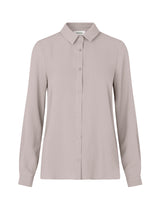 Klassisk skjorte i grå/beige i en løs og afslappet pasform. Ossa shirt har en lille krave, smal manchet og knapper i matchende farve for et ensartet design. Modellen er 173 cm og har en størrelse S/36 på i hvid.