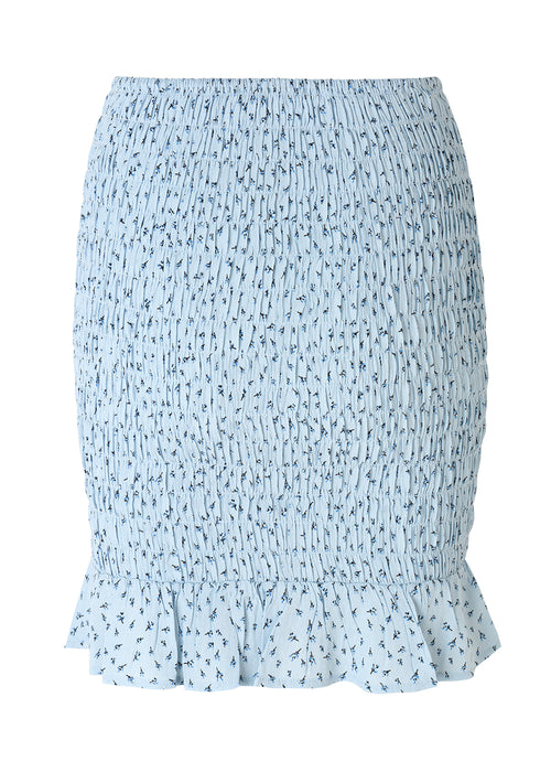 Porscha print skirt er en kort nederdel med elastisk smock over hele skørtet, som afsluttes med en bred flæsekant. Det blomsterprintede materiale er en EcoVero viskosekvalitet.