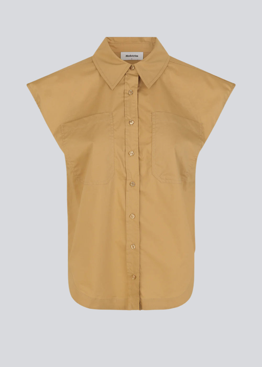 Skjorte i økologisk bomuld. RobertaMD ss shirt er uden ærmer men med brede skuldre, brystlommer og rundet kant. Ryggen har flot wienerlæg. Modellen er 173 cm og har en størrelse S/36 på.  Køb matchende bukser: RobertaMD pants, i samme farve.