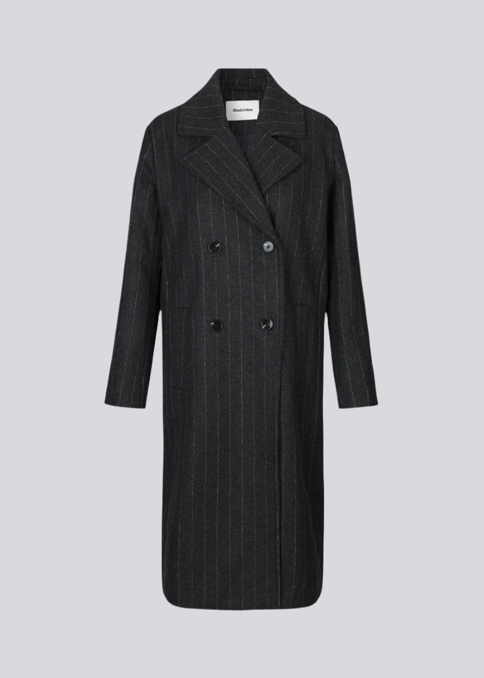 Dobbeltradet frakke i uldkvalitet med krave og revers. StinnaMD coat har en afslappet pasform og et klassisk, herreinspireret snit. Paspolerede forlommer og slids bagpå.