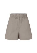 Shorts i let, økologisk bomuldspoplin. TapirMD shorts har høj talje med beklædt elastik og korte, vide ben. Lommer i sidesømmen samt kort slids i siderne.  Materiale: 100% Økologisk Bomuld