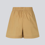 Shorts i let, økologisk bomuldspoplin. TapirMD shorts har høj talje med beklædt elastik og korte, vide ben. Lommer i sidesømmen samt kort slids i siderne.  Materiale: 100% Økologisk Bomuld