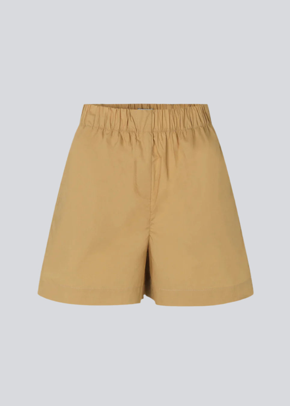 Shorts i let, økologisk bomuldspoplin. TapirMD shorts har høj talje med beklædt elastik og korte, vide ben. Lommer i sidesømmen samt kort slids i siderne.  Materiale: 100% Økologisk Bomuld
