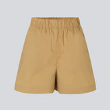 Shorts i let, økologisk bomuldspoplin. TapirMD shorts har høj talje med beklædt elastik og korte, vide ben. Lommer i sidesømmen samt kort slids i siderne.  Materiale: 100% Økologisk Bomuld