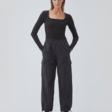 Cargobukser i nylon med elastisk talje og justerbare kanter med løbesnor. TrentMD pants har påsyede lommer på benene. Farven er sort.  TrentMD pants er lavet på samme model som vores meget populære og udsolgte AmayaMD pants. Dog i en kraftigere kvalitet, perfekt til efterår og vinter. 