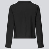 Skjorte i kvalitet af Eco Vero viskose. TrudaMD shirt har krave og åbning foran med lukning med sløjfer og lange ærmer med slids.